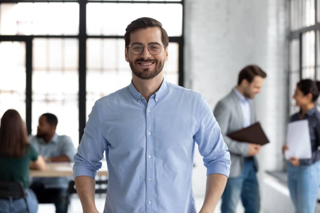 Portrait,Of,Happy,Millennial,Male,Business,Owner,In,Modern,Office.